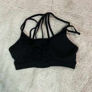 GAIAM strappy black sports bra. Size S.